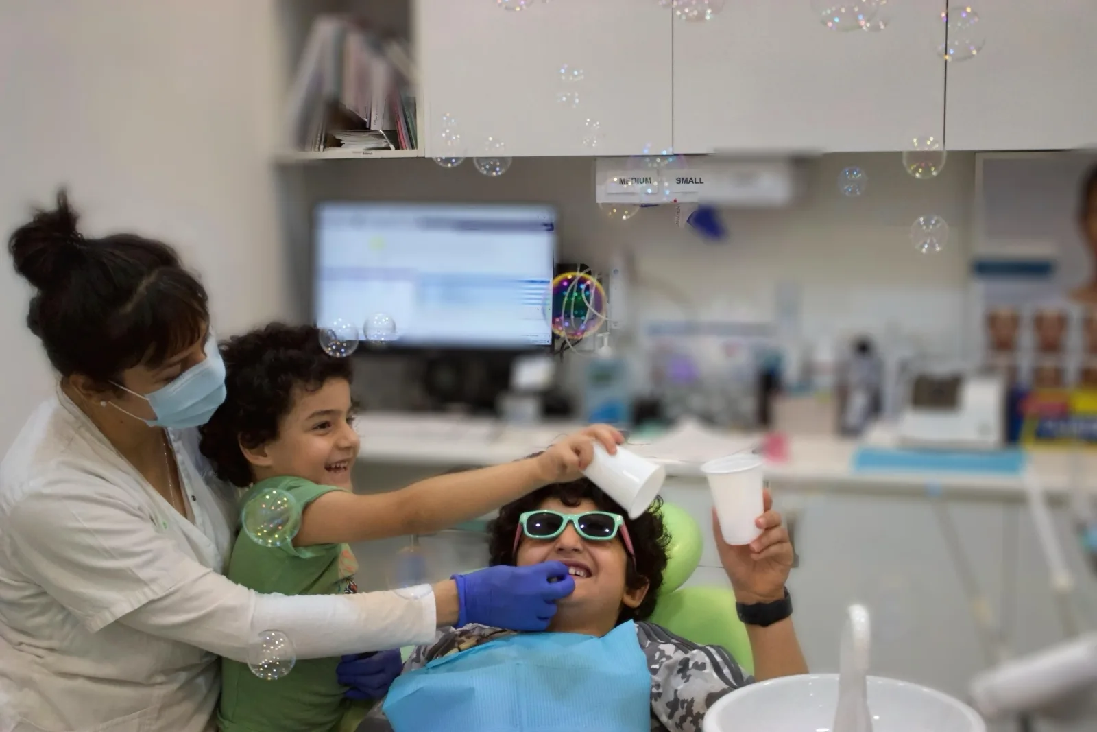 Dr Ellie supporting a child during a gentle dental visit in Blackburn North