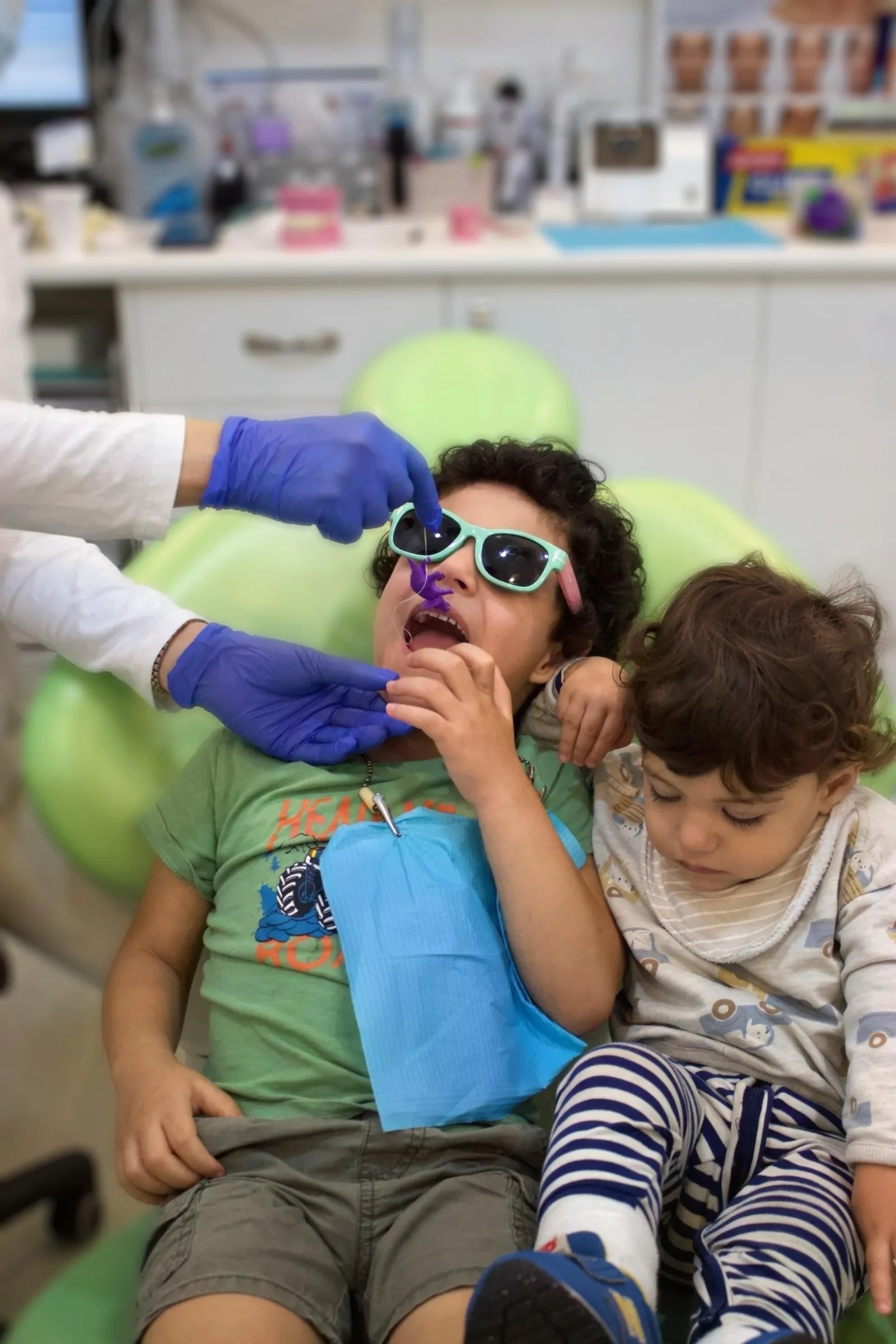 Child receiving a small reward after a children’s dental visit in Blackburn North