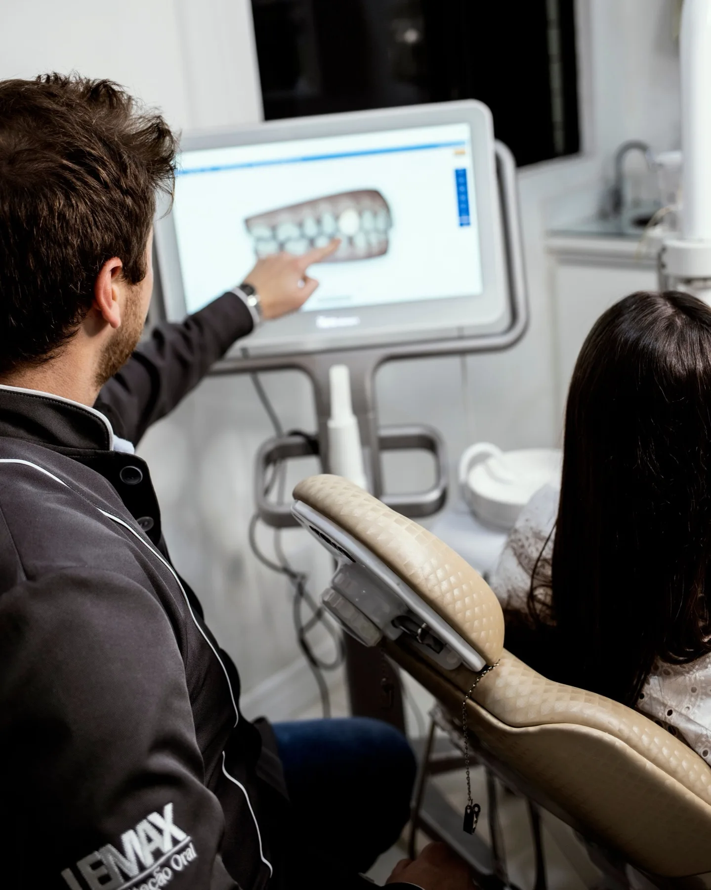 Dentist discussing digital denture and tooth replacement planning in Blackburn North